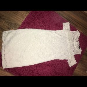 White dress with lace layer on top
